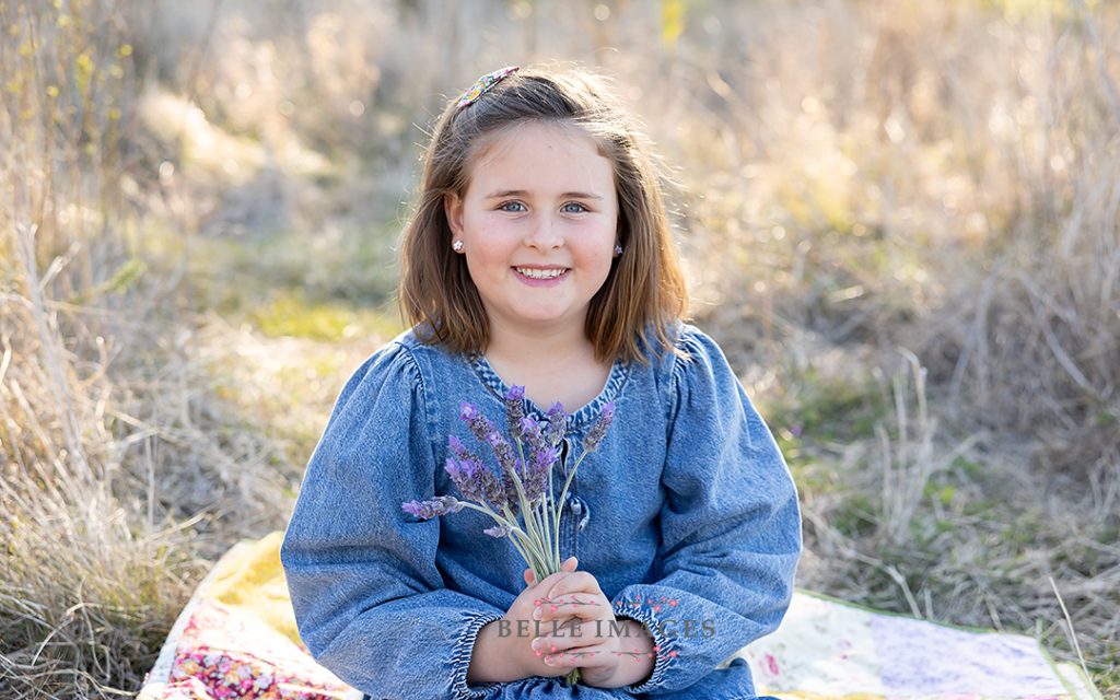girl holding bunch of lavender at toowoomba family photo session