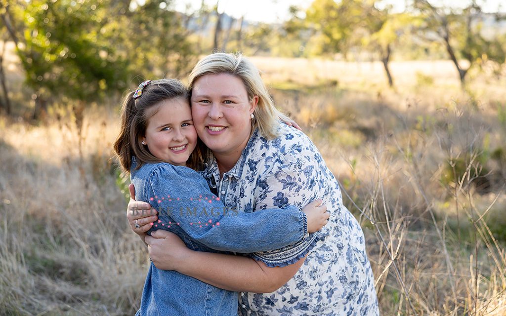 girl hugging mother at toowoomba family photo session