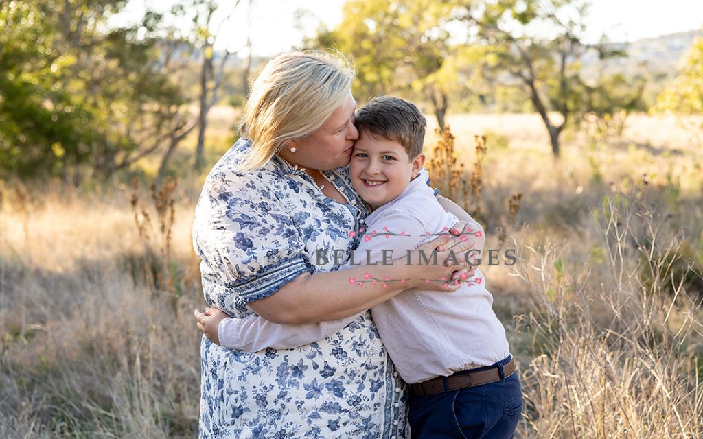 mother giving son a hug at toowoomba family photo session